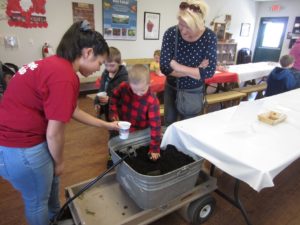 children planting seeds