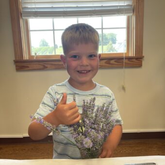 Boy giving thumbs up