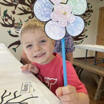 Boy with flower craft