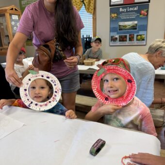 Family with apple craft