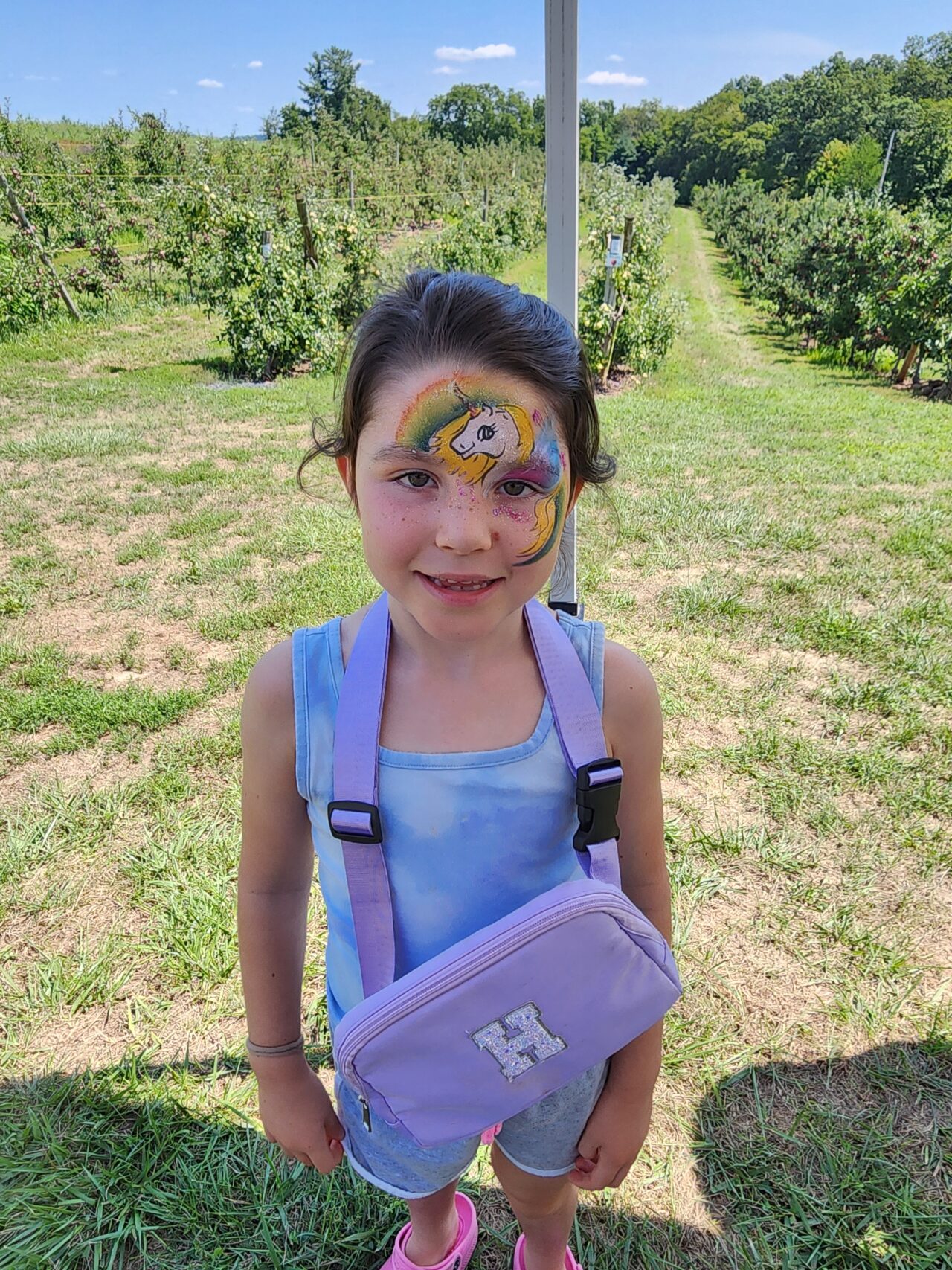 Young girl with face paint.